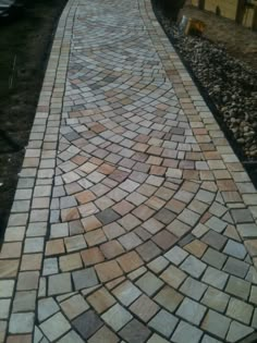 an image of a walkway made out of bricks