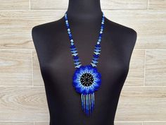 Beautiful long Mexican bead jewelry necklace, perfect complement to give a touch of color and style to any outfit and occasion. Piece made entirely by hand  Shipped anywhere in the world. Huichol Necklace, Handwoven Blue Beaded Necklaces, Unique Blue Handwoven Beaded Necklaces, Unique Handwoven Blue Beaded Necklaces, Unique Handwoven Blue Beaded Necklace, Traditional Blue Handwoven Necklaces, Blue Handwoven Beaded Necklace, Blue Handwoven Necklaces With Round Beads, Handwoven Blue Beaded Necklaces For Festivals