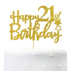 a happy 21st birthday cake topper with gold glitter