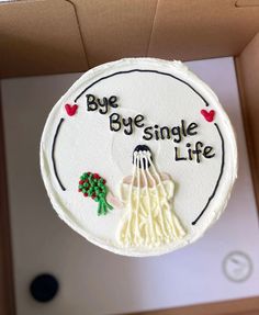 a cake in a box that says bye single life