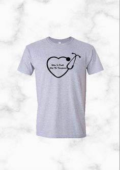 a grey t - shirt with a heart and a stethoscope on it