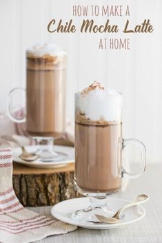 two glasses of hot chocolate drink with whipped cream on top and the words how to make a chile mocha latte at home