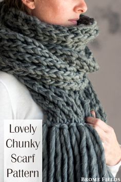 a woman wearing a gray scarf with text overlay that reads lovely chunky scarf pattern