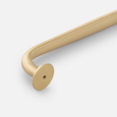 an image of a brass handle on a white background