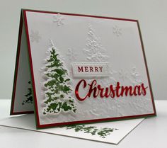 a merry christmas card with a tree on it