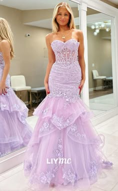 Elevate your prom look with our LP1808 Sweetheart Sleeveless Sheer Floral Appliques Mermaid Prom Dress. The delicate floral appliques and mermaid silhouette create a romantic and alluring look. With a sweetheart neckline and sheer details, this dress is perfect for making a statement. Feel confident and gorgeous on your special night. Prom Dresses Lavender, Purple Ball Gown, Popular Prom Dresses, Beaded Mermaid, Matric Dance, Strapless Long Dress, Mermaid Prom Dress, Prom Ideas