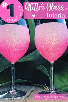 two wine glasses with pink glitter on them