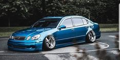 a blue car parked on top of a basketball court