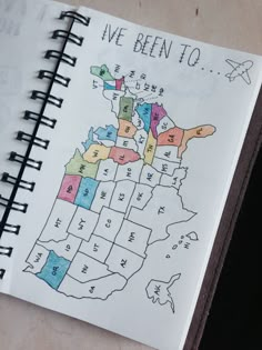 a notebook with a map drawn on it