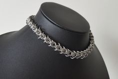 "Handcrafted from premium-quality stainless steel chainmail rings expertly weaved in the Rosetta link chainmail pattern. This made-to-order design imitates the 'strike & spike' effect of barbed wire creating a gorgeous horroresque style aesthetic. The design is completed with a secure 316 stainless steel spring clasp and 2\" adjustable extension chain to the back. Sizing: *Please take accurate measurements, do not estimate* The sizes listed for this design indicate the total length of necklace chain at its shortest setting including all hardware. Sizing: using a flexible measuring tape (seamstress tape) to take an accurate measurement around the base of your neck or down to where you would like the choker or necklace to sit. Round up to the nearest whole inch for half measurements. e.g. ba Chainmail Ring, Chainmaille Jewelry Patterns, Chainmail Patterns, Chainmail Necklace, Chainmail Jewelry, Gothic Rose, Chain Maille Jewelry, Barbed Wire, Chain Mail