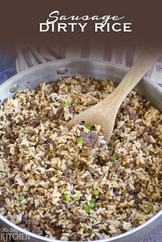 a pan filled with rice and meat on top of a table