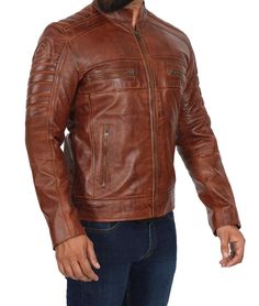 Men's Cognac Cafe Racer Tall Leather Jacket
This cognac cafe racer tall jacket has a fitted look which is made from real lambskin leather and includes an upright collar with padded features on the shoulders, arms, and elbow area. Moreover, it included 4 outside zipper pockets and 3 inside pockets for keeping essentials. This modern-classic design has perforated leather that allows sweat to evaporate and offers a cozy feel.

 



 

FAQs

	
		
			
			How long will a real leather jacket last?
		
		
			
It is one of the most durable materials that exist, you can wear it for years even decade as it is genuine leather and hence called a long-time investment. With characteristics, we can learn about the quality of leather such as whether it is a top-grain leather either lambskin or cow Rugged Fitted Brown Biker Jacket, Rugged Brown Fitted Biker Jacket, Brown Rugged Fitted Biker Jacket, Brown Fitted Rugged Biker Jacket, Winter Fitted Cafe Racer Biker Jacket, Fitted Vintage Brown Leather Winter Jacket, Fitted Vintage Brown Leather Jacket For Winter, Rugged Fitted Distressed Brown Biker Jacket, Distressed Brown Fitted Leather Biker Jacket