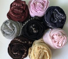 "Beautiful solid sheer square scarves with unique hand embroidery.  Made in finely woven georgette/chiffon fabric Great quality for a great price Beautiful gift for mom or For someone you love Hurry, Hurry Before we run out of stock Enjoy free shipping While quantities last! Available in 8 colours to match your outfits.  Finely woven fabric to give that soft touch and feel and also the durability to last for a life time.  The edges of the scarves are secured using  a machine rolled hemming stitch.   Custom designed with beautiful hand crafted form of embroidery originating from the Moghul Era in India.  Read an excerpt from the history below. Product Details:  Fabric:  Soft chiffon georgette made in India. Finely woven, excellent quality with absolutely no pilling.  Size: 112 X 112 cms Col Moghul Architecture, Unique Hand Embroidery, Hem Stitch, Embroidered Scarf, Rolled Hem, Neck Scarves, Square Scarf, Chiffon Fabric, Scarf Styles