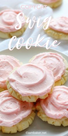 some cookies with pink frosting on top and the words copycat sing cookie above them