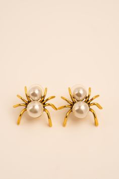 Elevate your style with our Spider Earrings, a perfect blend of minimalism and Gothic charm. These captivating earrings feature spider-shaped studs adorned with lustrous pearls, symbolizing the enigmatic and the elegant. In many cultures, spiders represent creativity, patience, and the weaving of fate. Embrace the profound symbolism of the spider with these unique accessories that make a statement wherever you go! Product ships from the USA within 1-3 days If there's anything you're unsure of or would like to clarify, please don't hesitate to reach out. We'd be more than happy to assist you. Thank you for shopping with Daydreambasket! Please check out our store for more lovely products https://etsy.me/3fv5TGq Follow us on Facebook @daydreambasket Instagram @daydreambasket Tiktok @daydreamb Pearl Spider, Halloween Jewellery, Earrings Weird, Halloween Grunge, Weird Earrings, Cool Earrings, Earrings Gothic, Grunge Jewelry, Spider Earrings