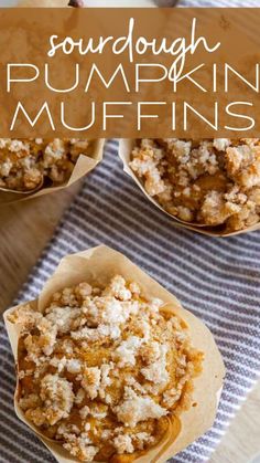 some muffins are in paper cups on a table with the words sourdough pumpkin muffins