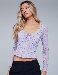 Full Tilt Embroidered Mesh Long Sleeve Top. This Top Features Delicate Floral Embroidery That Sprawls Across The Entirety Of The Sheer Mesh Fabric. Scoop Neckline. Ruched Detailing And Tie At Center Chest. Long Sleeve. Lettuce Edge Trim. Fitted Silhouette. Cropped Length. 60% Nylon, 40% Viscose, Hand Wash. Imported. Cute Long Sleeve Tops, Coquette Clothing, Emma Style, Wwe T Shirts, Full Sleeve Top, Mesh Long Sleeve Top, Girls Blouse, Full Tilt, Outwear Jackets