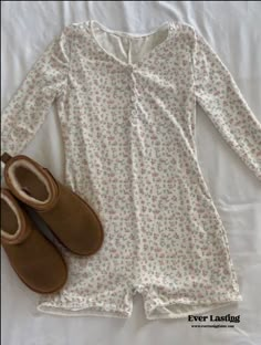 Experience relaxation and style with our Blossom Floral Cotton Pajama Bodysuit. Crafted from 100% cotton, this cozy bodysuit offers the perfect blend of softness and breathability, ensuring a restful night's sleep or lounging in comfort. The exquisite blossom floral pattern adds a touch of elegance, while the stretchy design and convenient snaps make it easy to wear. Upgrade your bedtime routine with this chic and comfortable Blossom Floral Cotton Pajama Bodysuit, perfect for lazy days and laid- Pj Sets Shorts, Shein Pajama Set, Cute Pijamas Coquette, Girly Pajama Set, Pajama Dress Nightgowns, Cottage Core Pajamas, Pink Girly Clothes, Cute Pajamas Set, Cute Pink Pjs