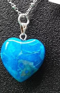 A blue riverstone heart necklace - a beautiful polished gemstone heart - hanging from a  stainless steel necklace included (18 in-20 in) with lobster claw clasp. Pensacola Fl, Heart Gemstone, Steel Necklace, Stainless Steel Necklace, Lobster Claw, Heart Necklace, Pendant Necklaces, Jewelry Necklace Pendant, Medicine