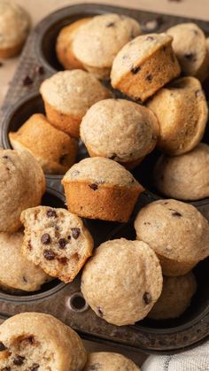 some muffins are sitting in a muffin tin