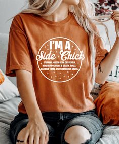 I'm a Side Chick Shirt, Cute Thanksgiving Shirt for Women, Thanksgiving Sweatshirt, Fall T-Shirt, Thanksgiving Party Tee, Funny Fall TShirt  Welcome to our small family business Glamour Apparel.  Your go-to place for all your shirt needs. We as Glamour Team offer ultra-soft shirts made with the highest quality fabrics for you. Our shirts are custom-made prints with the latest technology for long-lasting shirts.  Our Products 👕👚 ✓ Our shirts are handmade in the USA, designed, and shipped from o Thanksgiving Shirts For Women, Chick Shirt, Counting My Blessings, Side Chick, Fall Tshirt, Funny Fall, My Blessings, Thanksgiving Sweatshirt, Fall T Shirt