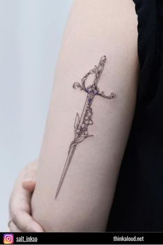 Swords and flowers are the perfect match, especially when we’re talking about tattoo motifs. A sword tattoo with a lily of the valley, for example, can be a great way to represent the purity, peace, sincerity, and joy that come with the courage to do what you want to do with your life. Swords Back Tattoo, Masculine Tattoos, Magic Tattoo, Ocean Tattoos, Sternum Tattoo, Vine Tattoos, Spine Tattoos For Women, Face Tattoo, Spine Tattoos