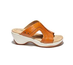 Meet your new go-to slide for any occasion: the Cassandra wedge sandal! The rich leather upper and hook-and-loop closure means you can add style to your everyday look while stepping in complete comfort. From Halsa. Leather Slides With Arch Support And Wedge Heel, Summer Toe Loop Sandals With Ortholite Insole, Summer Slides With Heel Loop, Comfortable Slide Wedge Sandals With Removable Insole, Summer Leather Mules With Ortholite Insole, Leather Mules With Ortholite Insole For Summer, Summer Slide Wedge Sandals With Arch Support, Modern Wedge Sandals With Ortholite Insole, Summer Wedge Heel Slides With Arch Support