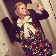 My tacky Christmas outfit. Purchased an apron, lots of bows and a big now and hot glued it all together!! Tacky Holiday Outfits, Diy Ugly Christmas Skirt, Christmas Vest Outfit Tacky, Ugly Sweater Apron, Christmas Tree Tutu Dress, Ugly Christmas Outfit, Holiday Sweater Party