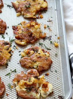 some food is laying on a baking sheet and ready to be cooked in the oven