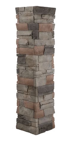 a tall brick tower made out of various colored bricks on a white background with clippings for text