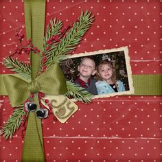 a christmas card with an ornament on it and two children in the background