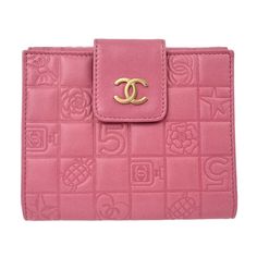 Introducing the luxurious Chanel Pink Icon Bifold Wallet, a timeless accessory that exudes elegance and sophistication. Crafted from high-quality lambskin leather in a soft pink hue, this wallet features the iconic Chanel logo embossed on the front. With its compact bifold design, it offers ample space for cards, cash, and coins, making it both practical and stylish for everyday use.The interior of the wallet is lined with smooth leather and includes multiple card slots, a bill compartment, and Chanel Icon, Chanel Pink, Chanel Logo, Pink Chanel, Timeless Accessories, Bifold Wallet, Fendi Bags, Burberry Bag, Lambskin Leather