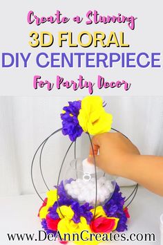 This pin features a vibrant 3D floral centerpiece with purple, pink, and yellow flowers. A hand is placing a battery-operated candle in the center of a candle holder filled with vase filler. Anime Centerpiece, Dollar Tree Floral Centerpiece, Floral Foam Ring Centerpiece, 3d Printed Centerpiece, How To Make Floral Hoop Centerpiece