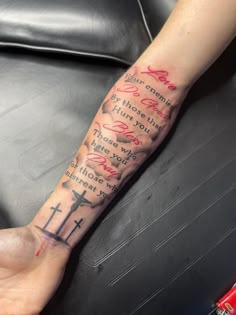 a person with a tattoo on their arm that reads, i am coming to heaven