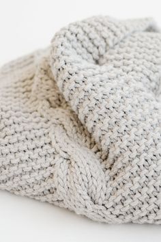 "Hand knit scarf with fringes. Extra chunky, made from a warm and soft wool blend. Handcrafted in Greece. DETAILS * Chunky knit * Soft wool blend (OEKO-TEX certified - STANDARD 100) * Hand wash in cool water SIZE & FIT * One size, fits most * Width: 23cm (9\") * Length: 170cm (67\") including fringes * Custom sizing available upon request COLORS & CARE * Here shown in Light Oatmeal * Video shows color Light Grey * Made to order in 15 colors * Hand wash in cool water, do not wring and lay Cable Scarf, Scarf Chunky, Cable Knit Scarf, Hand Knit Scarf, Fringe Scarf, Long Winter, Color Care, Wool Scarf, Soft Wool