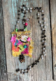 Handmade, one of a kind.
Created by dixie rhoades 

Mixed media textiles Butterflies Necklace, Bon Voyage Gift, Recycled Necklaces, Farmhouse Ornaments, Embroidered Ribbon, Scrap Art, Butterfly Necklace Gold, Necklace Butterfly, Textile Texture