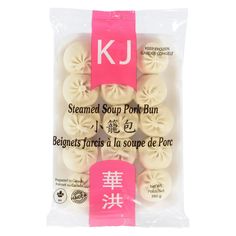 japanese steamed soup port - buns in plastic bag with pink ribbon on white background