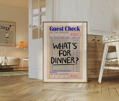 a poster with the words what's for dinner on it in front of a chair