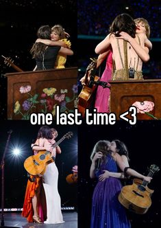 two women hugging each other on stage with one holding a guitar and the other singing