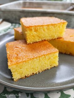 three pieces of cornbread on a plate