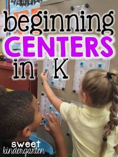 two children are playing with magnets on the wall in front of a bulletin board that says, beginning centers in k