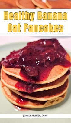 healthy banana oat pancakes with blueberry sauce on top