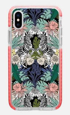 an iphone case with tropical leaves and flowers on the back in pink, green, white and