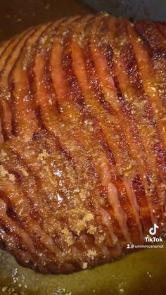 sliced meat sitting on top of a cutting board