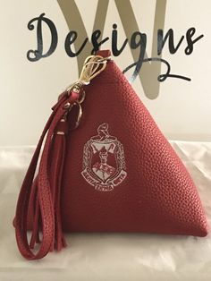 Delta Sigma Theta DST Diva Statement Wristlet! Red, Vegan, pebbled, leather, with white crest. Measures 7”x7”. Exclusive . #deltasigmatheta #dst #dst1913 #exclusive Canvas Sorority, Delta Sigma Theta Apparel, Delta Sigma Theta Gifts, Recruitment Sorority, Delta Girl, Cooler Painting, Sorority Paddles, Delta Sorority, Theta Sorority