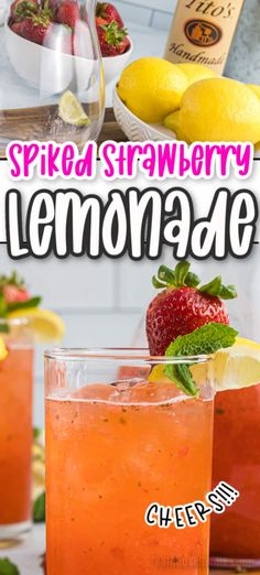 two glasses filled with lemonade sitting on top of a table next to strawberries and lemons