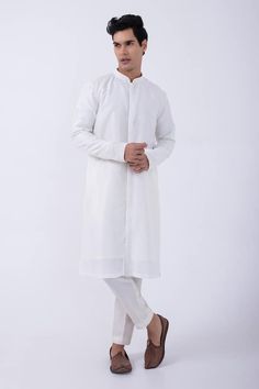 Ivory bam silk kurta with cutdana embroidered collar and cuffs. Comes with ivory cotton silk pyjama. - Aza Fashions White Cotton Silk Nehru Jacket With Chikankari Embroidery, White Cotton Silk Nehru Jacket For Eid, White Cotton Silk Sherwani With Dabka, Cream Long Sleeve Cotton Silk Kurta, Off White Cotton Silk Long Sleeve Kurta, White Cotton Silk Sherwani With Long Sleeves, White Cotton Silk Long Sleeve Sherwani, White Cotton Nehru Jacket With Dabka Detailing, White Cotton Nehru Jacket With Dabka