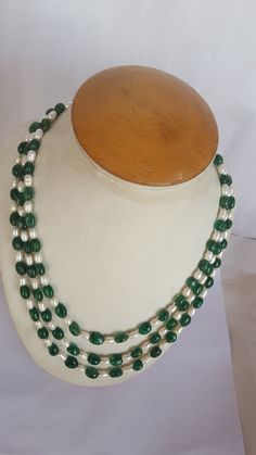 PRODUCT DESCRIPTION :-- Beautiful, Gorgeous Four Strands Precious Gemstone Green & white color Necklace   Stone Name : -- Natural Fresh Water Pearls, Beryl Emerald  Gemstone -- Oval (Smooth)  Length :-- 18-20" Inches comes in silk tassel.  Color :-- GAREEN & WHITE  Quality: -- AAA+  Size :---  6-8 MM Approximate  Carats :-- 432  Whole size. 0.50 MM The photographs of the items have been taken in natural daylight, without any enhancements or affects and all attempts have been made to depict the c Gemstone Colours, Necklace Stone, Color Necklace, Fresh Water Pearls, Water Pearls, Emerald Gemstone, Precious Gemstones, Stone Names, Gemstone Colors