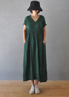 "★ Material: cotton and Linen ★ Model Size: -- Model wear size M -- Model is 170 cm / 5'8\" -- Model measurements (bust 31\" / waist 26\" / hips 36\" ) ★ In order to make it more suitable for you. please tell me your body measurements : -- your Height -- your Weight -- your Bust  -- Phone number for shipping Size S (US 4-6 | UK/AU 8-10 ) Bust: 94 cm / 37 inch  Shoulder: 38 cm / 15 inch Length: 120 cm / 47 inch Size M (US 8-10 / UK/AU 12-14) Bust: 100 cm / 39.4 inch Shoulder: 40 cm / 15.7 inch Length: 120 cm / 47 inch Size L (US 12-14 | UK/AU 16-18) Bust: 106 cm / 41.7 inch Shoulder: 40 cm / 15.7 inch Length: 120 cm / 47 inch Size XL (US14-16 | UK/AU 18-20 )  Bust: 116 cm / 45.6 inch Shoulder: 42 cm / 16.5\" Length: 120 cm / 47 inch Size XXL (US 18-20 | UK/AU 22-24 )  Bust: 126 cm / 49.6 in Relaxed Fit Short Sleeve Maxi Dress In Solid Color, Green Relaxed Fit Maxi Dress With Short Sleeves, Solid Color Linen Maxi Dress, Solid Color Relaxed Fit Maxi Dress With Short Sleeves, Solid Color Relaxed Fit Maxi Dress, Solid Color Relaxed Fit Short Sleeve Maxi Dress, Solid Short Sleeve Relaxed Fit Maxi Dress, Solid Relaxed Fit Short Sleeve Maxi Dress, Relaxed Fit Short Sleeve Solid Maxi Dress