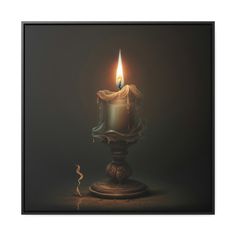 a lit candle sitting on top of a table